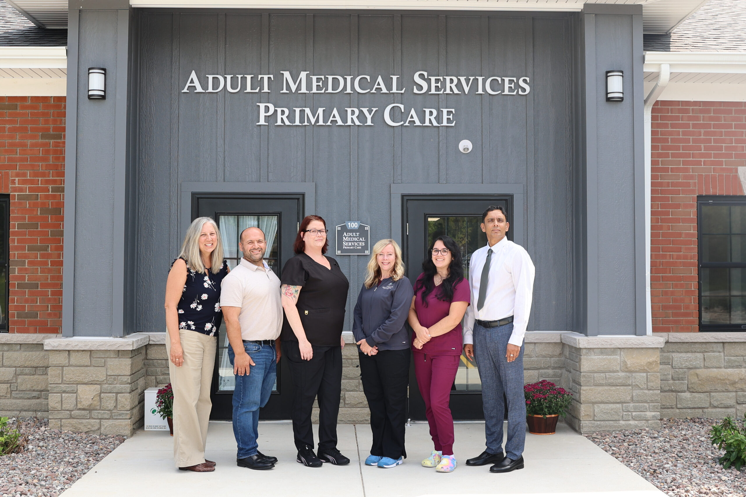 https://adultmedicalservices.com/wp-content/uploads/2024/09/outside-full-staff-2-scaled.jpeg